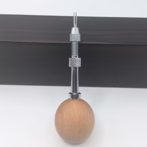 Photo of full tool with needle tip attached Swivel-headed interchangeable quilling needle with attached scrolling tip for multi-strip paper coils